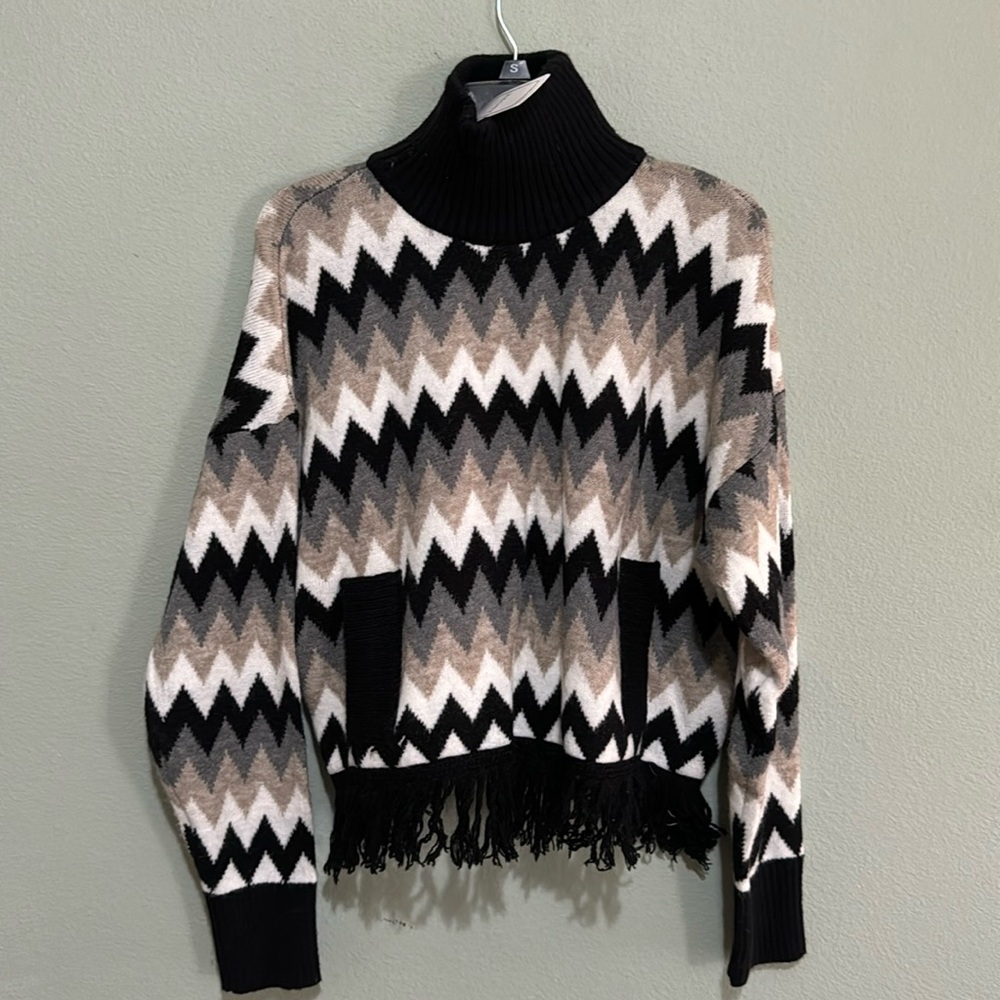 Very cute turtle neck sweater. You can dress it up or wear casual style.